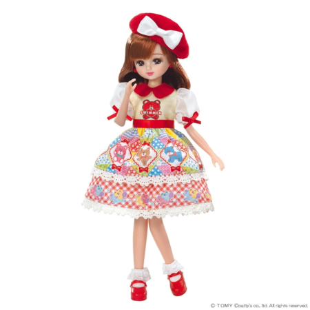 赤いベレー帽とカラフルなワンピースを着たファッションドール